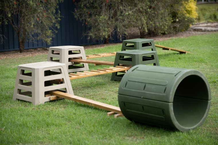 The Balance Climbing Set arranged across the lawn